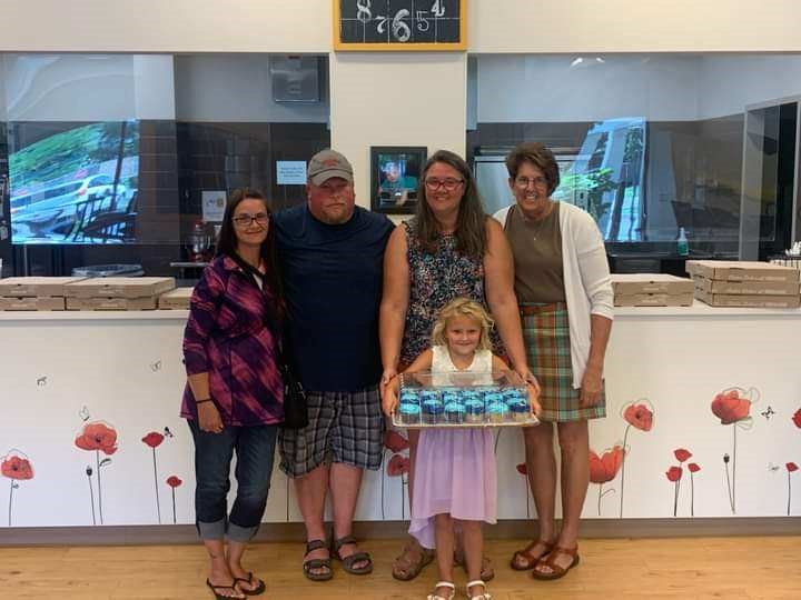 The Myers family celebrating Scarlett's birthday in 2022.