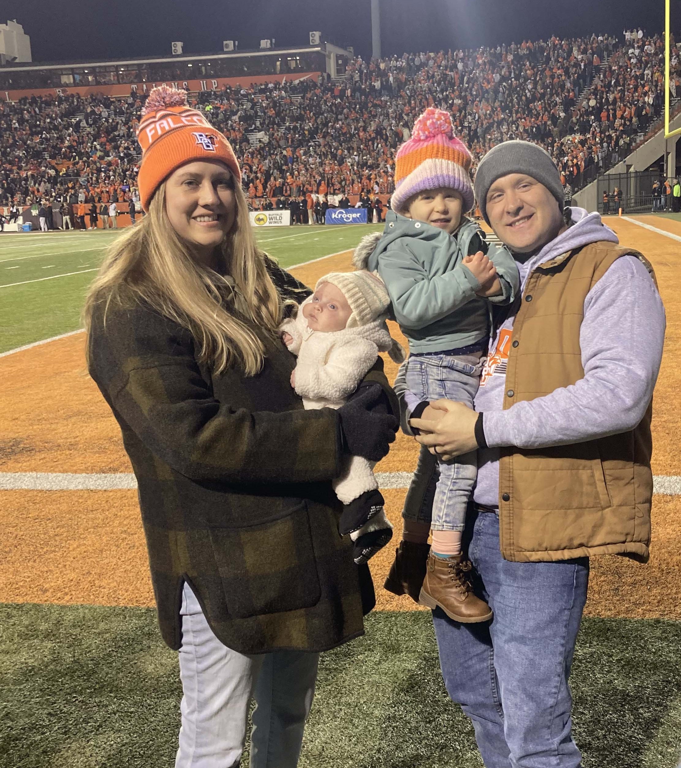 The Thieroff family being recognized as the famILY of the game during the Battle of I-75